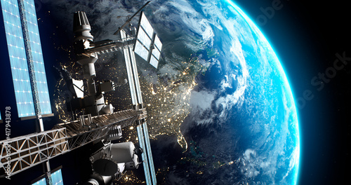 Fototapeta Naklejka Na Ścianę i Meble -  Artificial satellite flying over Earth