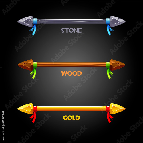 Gold, wooden, stone spears with a ribbon for the flag.