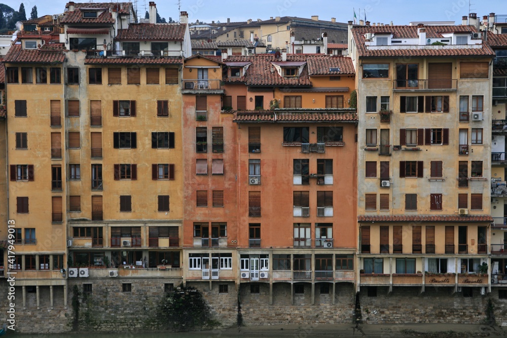Obraz premium Florence, Italy. Arno river shore buildings. 
