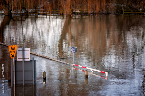 After the snow melt and heavy rainfall, the Thames overflows and floods a large part of the area around it. photo