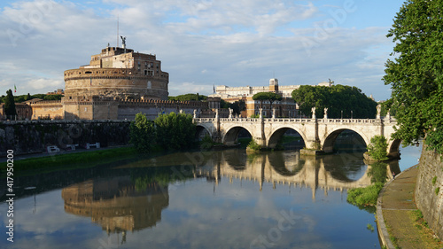 Castel Sant'Angelo circular castle above Tiber River and St. Angelo Bridge, popular tourist landmark in Rome, Italy