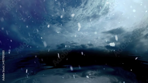 Fototapeta Naklejka Na Ścianę i Meble -  Snowing on Stormy Clouds Over Dark Ocean