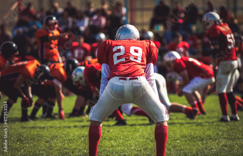 american football players during a game