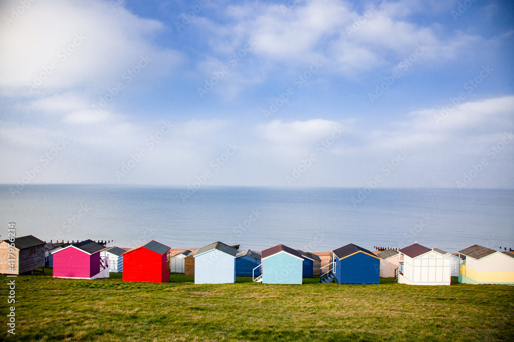 row of beach huts in Tankerton near Whitstable in Kent - British summer