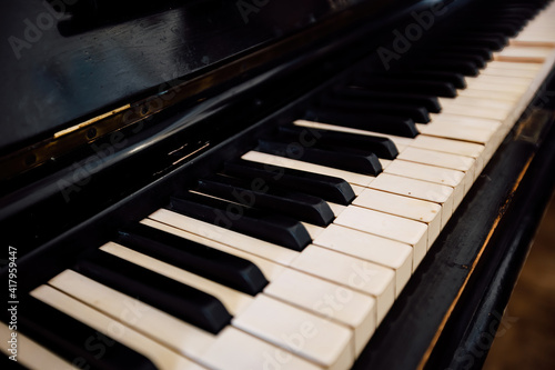 Old vintage piano keyboard. Close up view © Mulderphoto