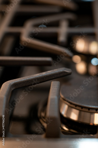 close up of a gas stove burner © James S. Cowan