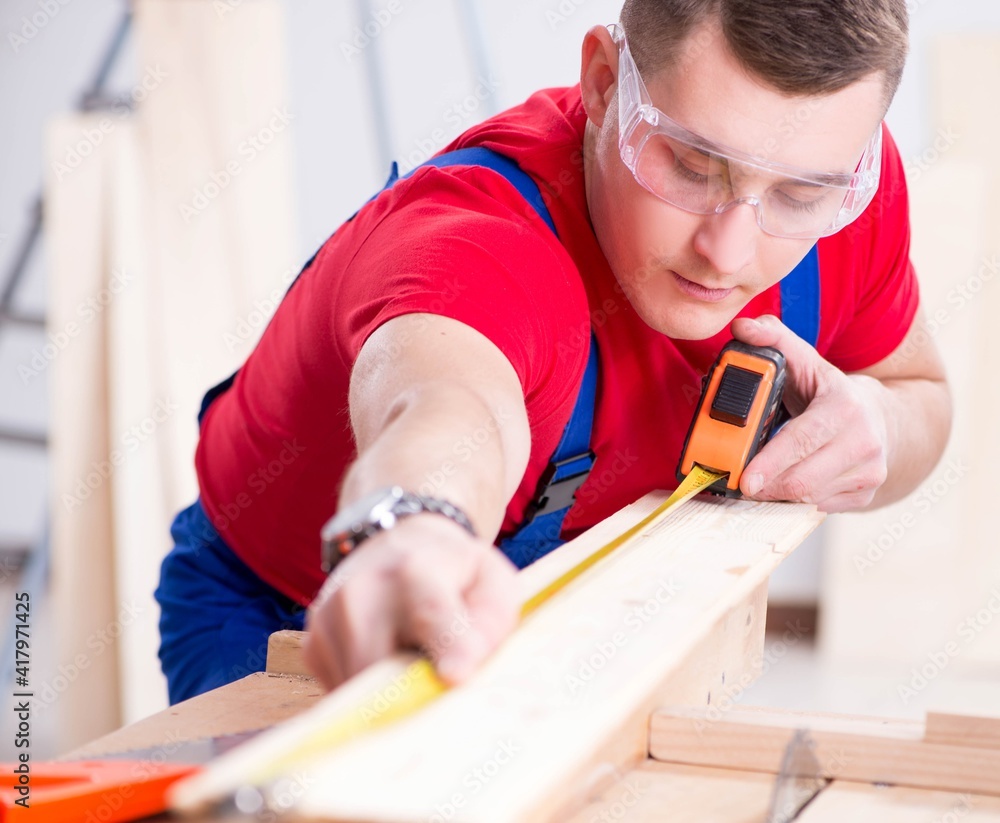 Contractor working in the workshop Contractor working in the workshop