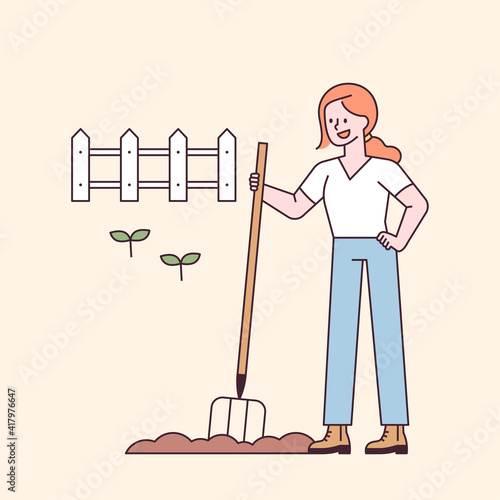 A woman is picking the land with farm equipment. flat design style minimal vector illustration.
