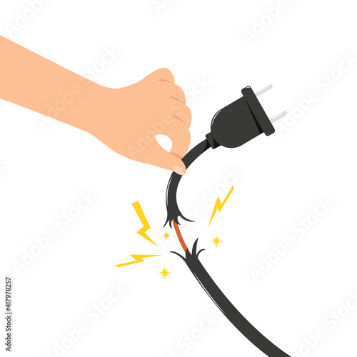 Electric shock plug in hand, Do not plug it danger, Hand holding a dangerous damaged electrical cord.