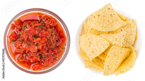 Fresh salsa dip and Corn chips, nachos in bowl isolated on white background. Recipe: tomatoes, onions, cilantro, hot jalapeno peppers or chilli pepper and salt. Traditional Mexican food appetizer.