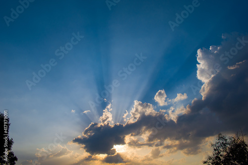 Canvastavla landscape picture mountain and sun rays penetrating through clouds