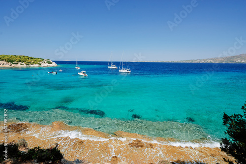 Beautiful landscape with blue lagoon and beach. Moni Eginas Island, Saronic gulf, Greece . A famous tourist destination.