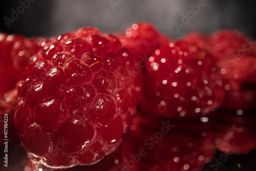 Fresh raspberries in close-up - macro sliding shot- food photography