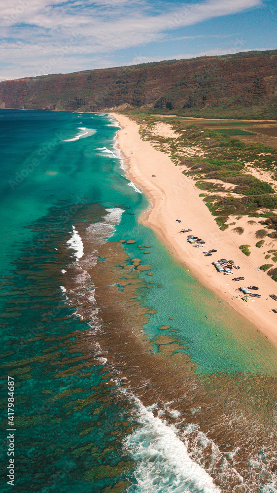 Fototapeta premium aerial drone over polihale beach showing reef