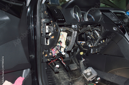 View of the electrical equipment of the car interior under the dashboard