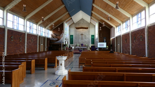 Foto shot of religious Christian or catholic chapel and altar for worshippers