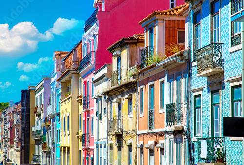 Colorful buildings of Lisbon historic center near landmark Rossio Square.