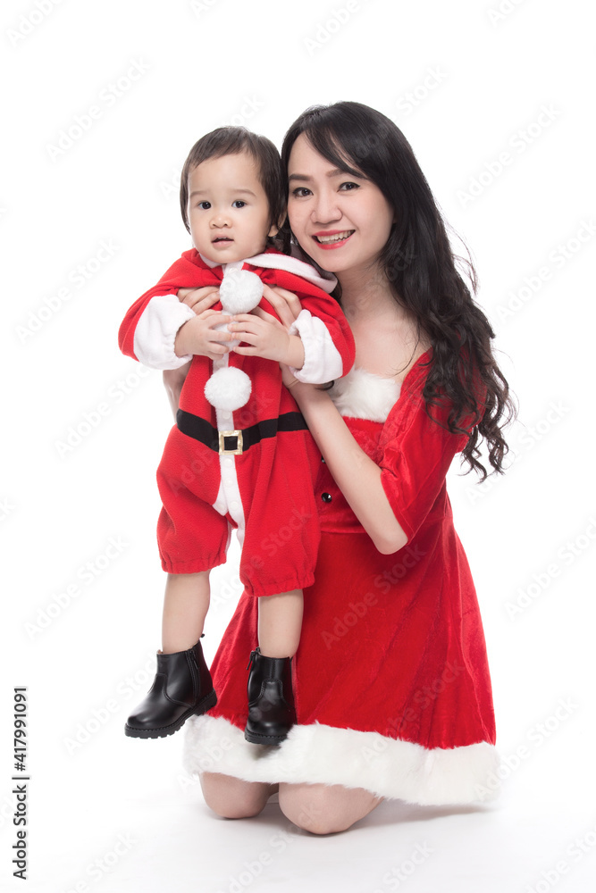 Mother and son with christmas custome playful on white background. Mother and son with christmas custome playful on white background.