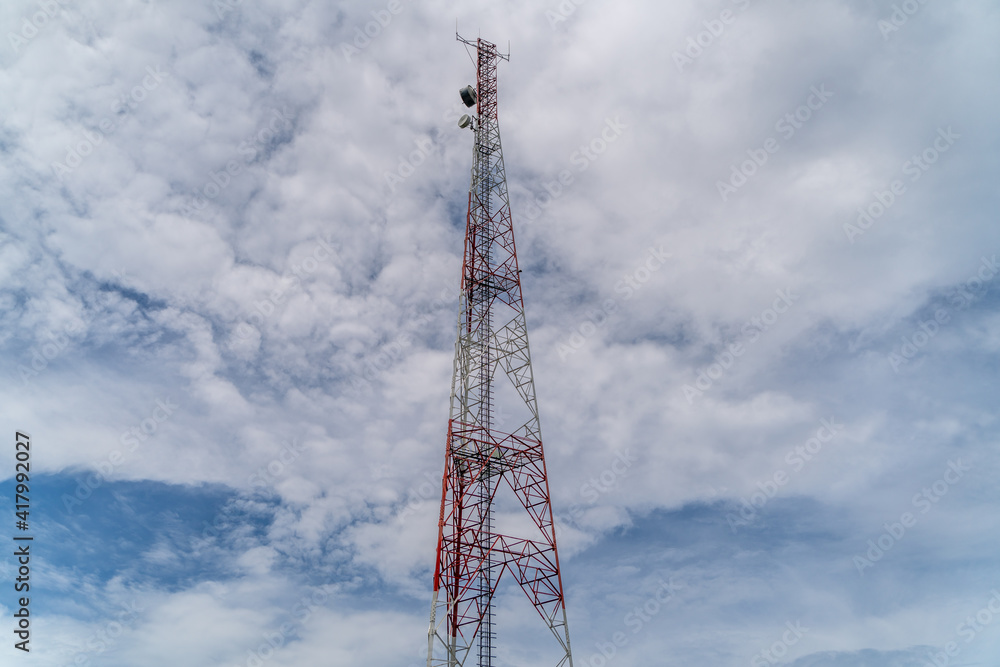 Telco Trellis for 4G 5G Apocalypse Internet Communication, FM Radio and Television Broadcasting On Air with Blue Sky in Background. Telco Trellis for 4G 5G Apocalypse Internet Communication, FM Radio and Television Broadcasting On Air with Blue Sky in Background.