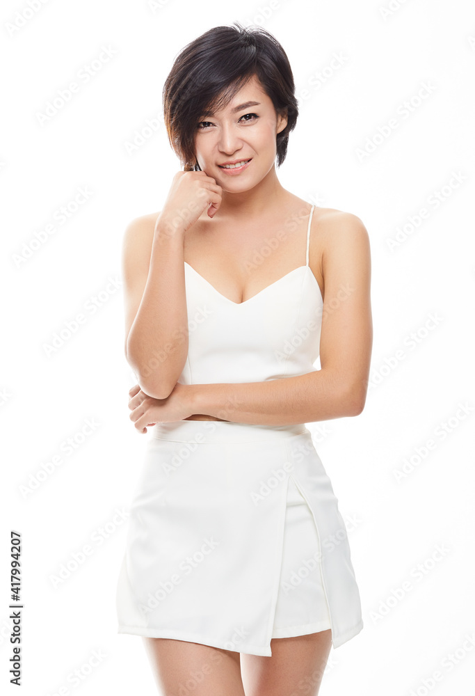 Atractive asian woman isolated on white background. Atractive asian woman isolated on white background.