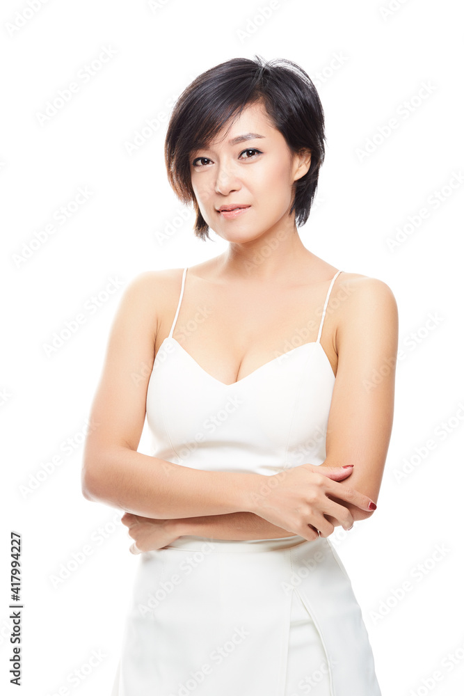 Atractive asian woman isolated on white background. Atractive asian woman isolated on white background.