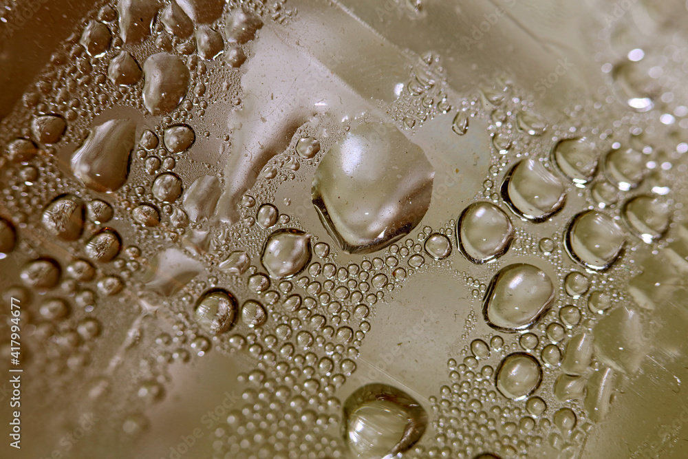 Macro shooting of water droplets beside the glass surface close up liquid drops modern background pattern high quality print Macro shooting of water droplets beside the glass surface close up liquid drops modern background pattern high quality print