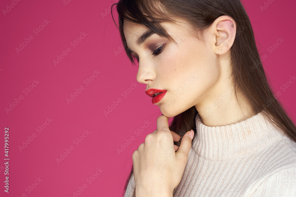 Woman with red lips bright makeup white blouse long hair pink background Woman with red lips bright makeup white blouse long hair pink background