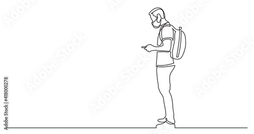 continuous line drawing of full length standing man with backpack checking his phone wearing face mask