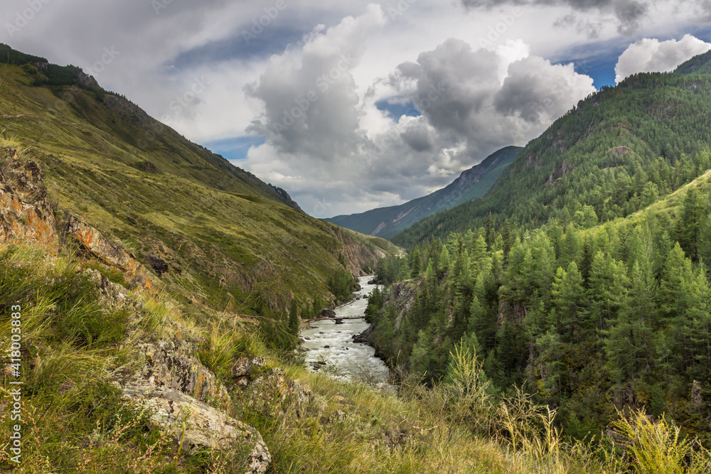 Raging mountain river, Chuya Tributary of the Katun River. Mountain Altai Raging mountain river, Chuya Tributary of the Katun River. Mountain Altai