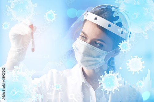 Scientist with sample of co...