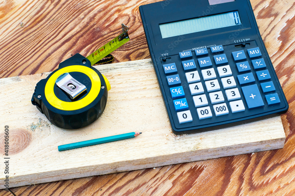 construction metertape measure calculator for calculations pencil and