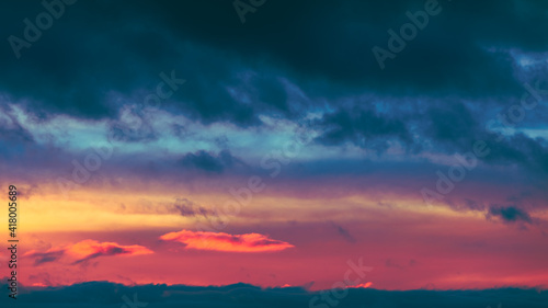 Sunrise Sky. Bright Dramatic Sky With Colorful Clouds. Yellow, Orange And Magenta Colours