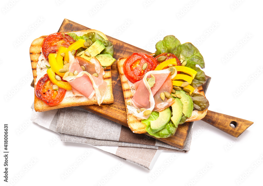 Wooden board with fresh tasty bruschettas on white background Wooden board with fresh tasty bruschettas on white background