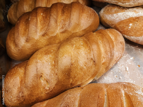 Bread on a shelf in a bakery store.