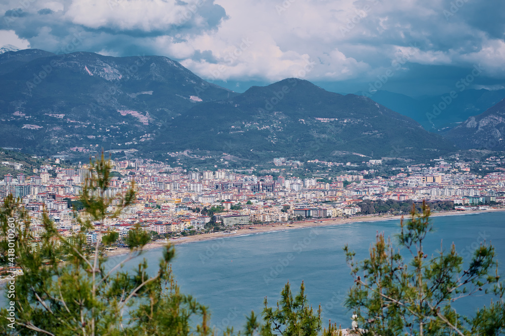 Beautiful view of Alanya city with mountains and sea bay.