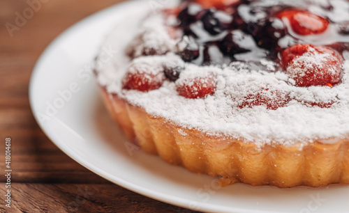 Wallpaper Mural Simple homemade pie with strawberries and cherries on a wooden table. Torontodigital.ca