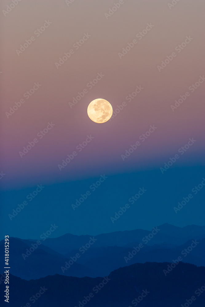 Full Moon Rising over the Himalayas at Dawn, as seen from Poon Hill, Nepal