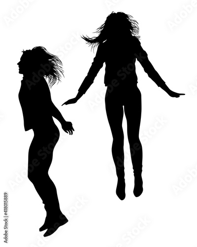 Young women are dancing in a nightclub. Isolated silhouettes on white background