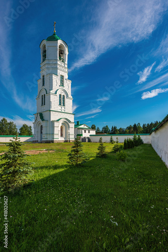 The belfry of the stone church of the Intercession of the Mother of God. Holy Trinity Alexander Svirsky Monastery in the Leningrad region, known for architectural monuments. photo