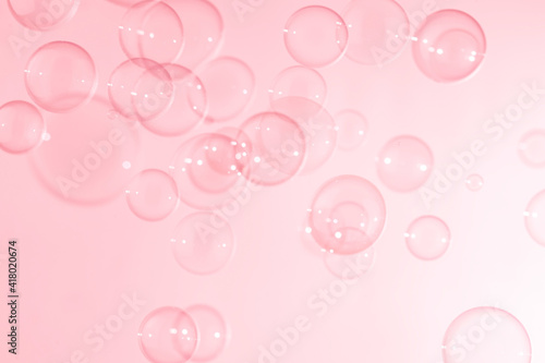 Natural freshness transparent pink soap bubbles background. 