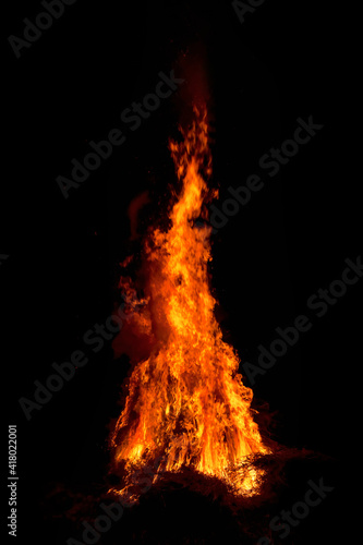 Fire flames on black background. Blaze fire flame texture for background