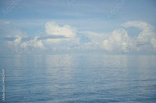 Calm sea ocean and white cloud on the blue sky  Seascape 