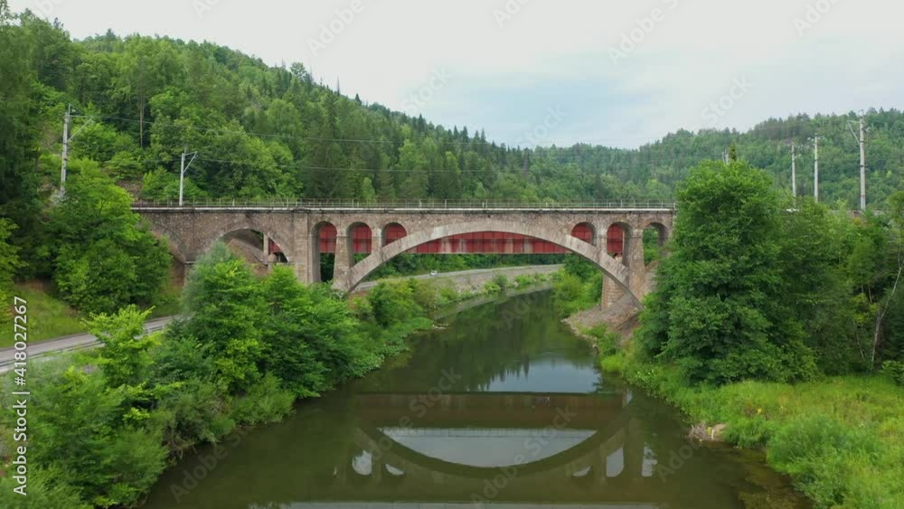 Nikolsky stone bridge over the Sim river in the Chelyabinsk region of Russia. The author of the project Belelyubsky. Aerial Video Nikolsky stone bridge over the Sim river in the Chelyabinsk region of Russia. The author of the project Belelyubsky. Aerial Video