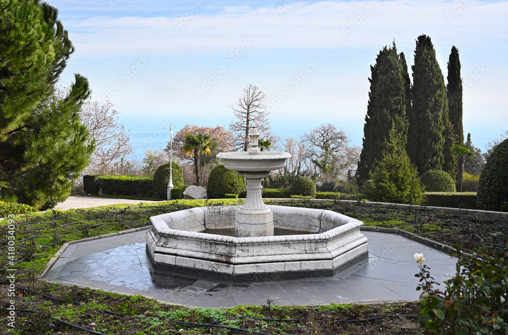 Old fountain in beautiful garden of Livadia Palace in Crimea
