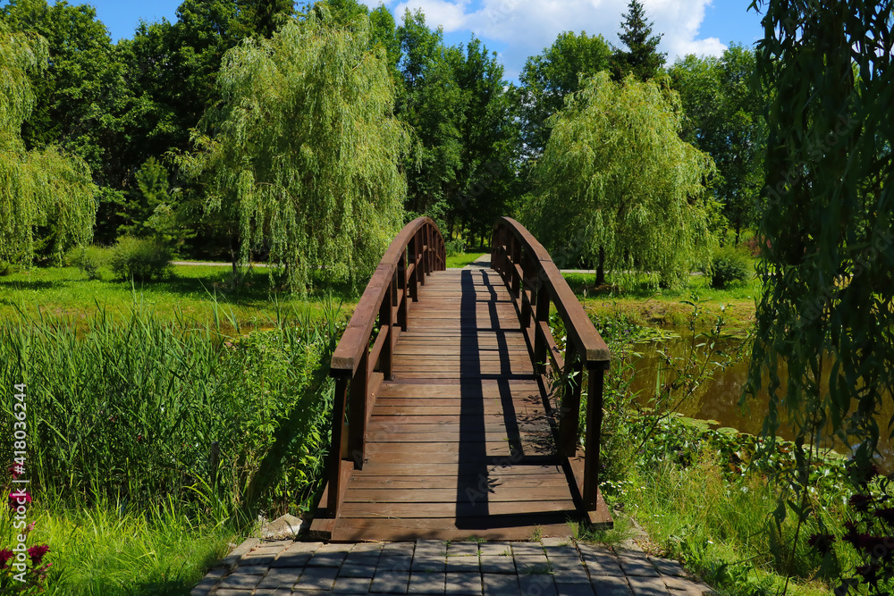 A beautiful wooden walkway across the lake.