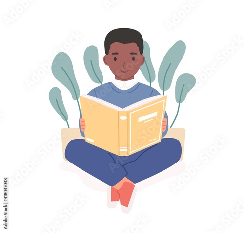 Happy African child reading book. Afro-American boy studying with textbook. S...