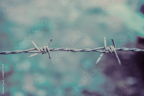 Grunge Barbed wire with blue vintage color background