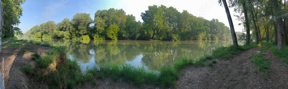 panoramic photo of the lake and forest in the afternoon