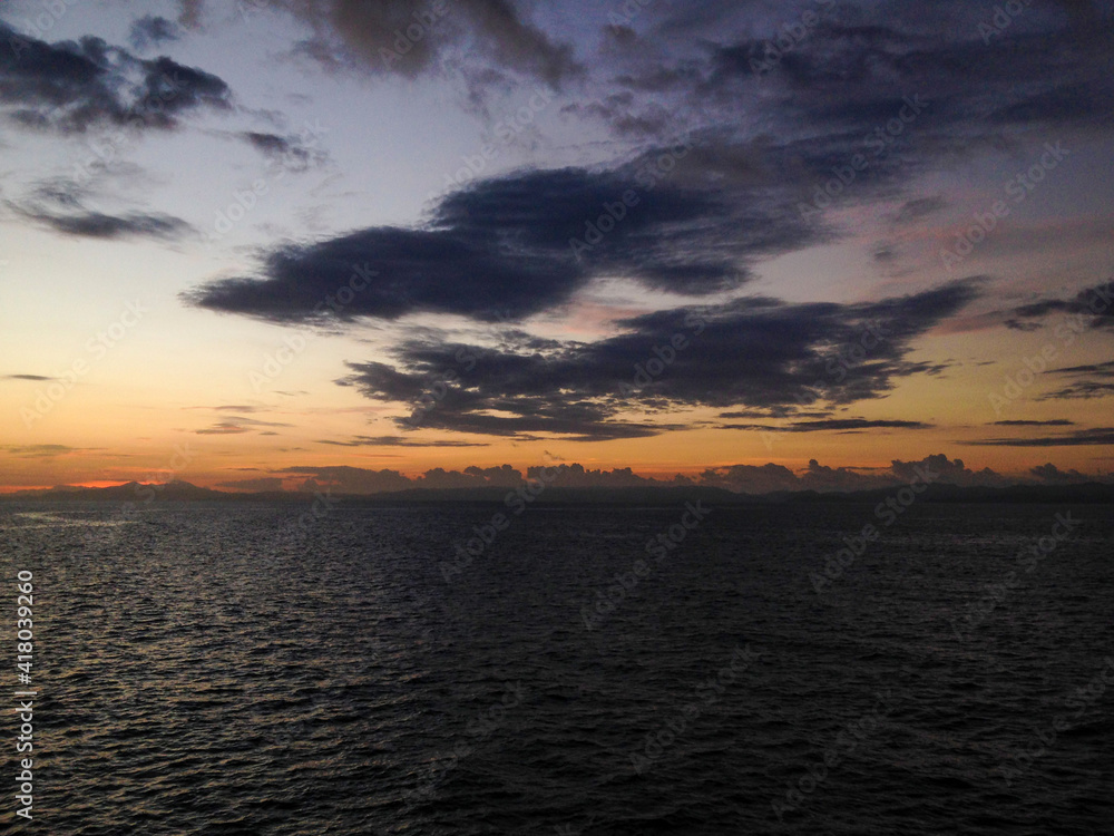 A stunning sunrise view from a ship at Lombok strait Bali Lombok Indonesia