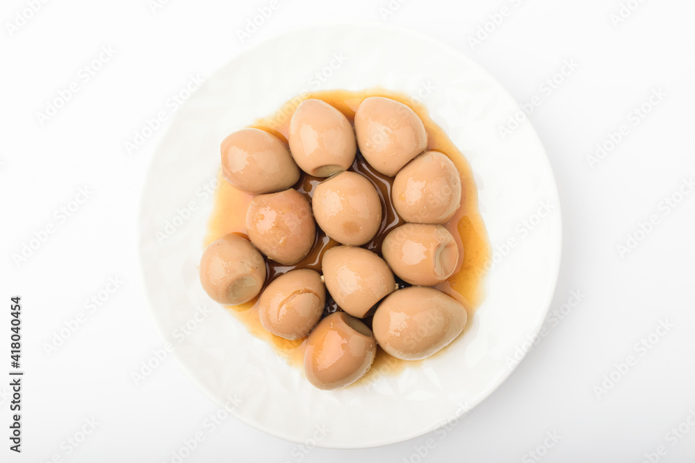 Stewed quail eggs on a white background Stewed quail eggs on a white background